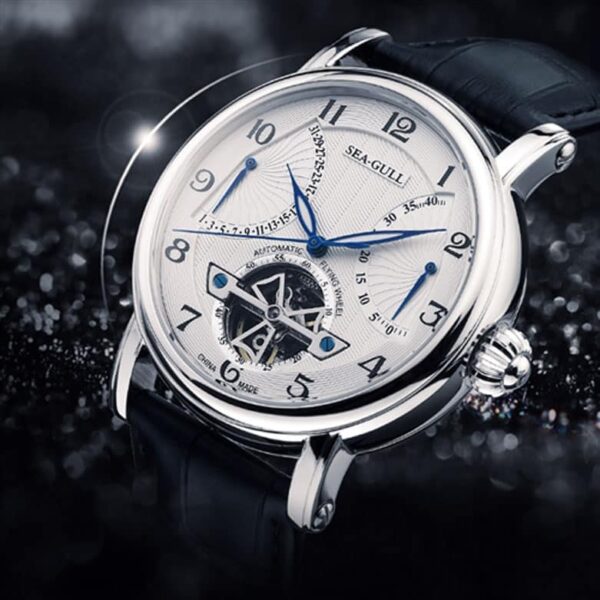 MONTRE SEA-GULL FLYING WHEEL DATE INDICATOR