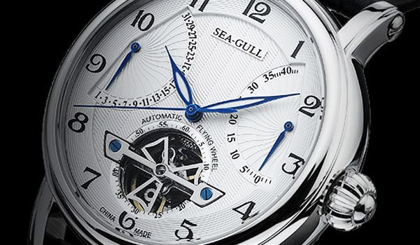 MONTRE SEA-GULL FLYING WHEEL DATE INDICATOR